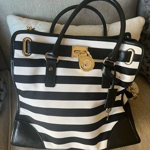 Authentic Michael Kors Black and White Fabric & Leather Handbag